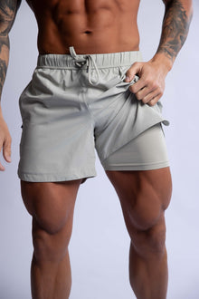  men's performance training shorts sage green zip pockets 